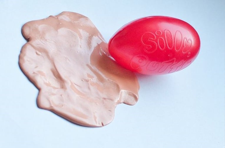 remove silly putty from clothing